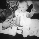 black and white photo of a baby, presumably Little Albert